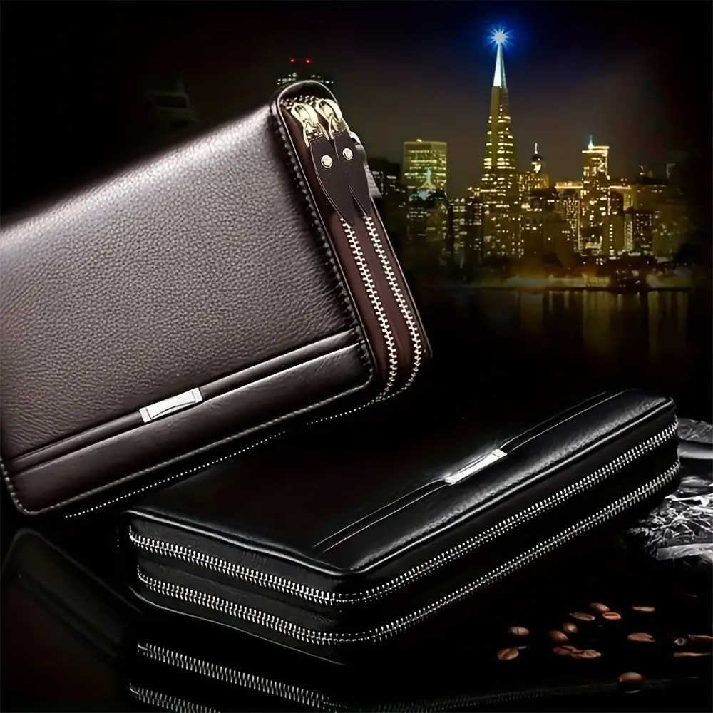 Dunkelbraune und schwarze Reißverschluss-Clutch-Geldbörsen mit Metallspange auf dunklem Untergrund